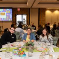 seven people at luncheon table photo 3